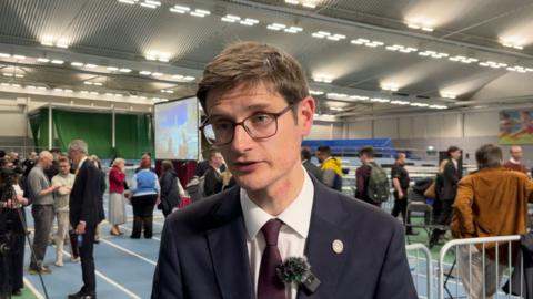 Outgoing council leader Tom Hunt reacts to losing his seat