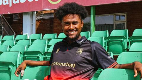 Sheridon Gumbs sat in the stands at Grace Road