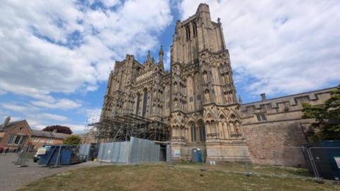 Wells Cathedral with scaffolding around it seen from the front