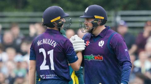 Brandon McMullen and Mark Watt in action against Australia