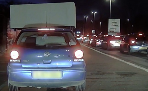 A sofa on a car roof