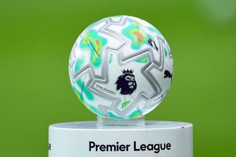 A Premier League branded ball on top of a Premier League branded plinth