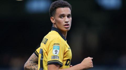 Wolverhampton Wanderers defender Ethan Sutherland in action