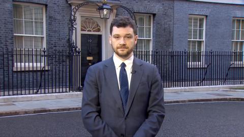 Henry Zeffman looks at the camera as he stands outside No 10