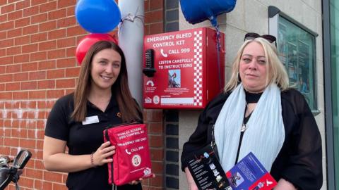 Margaret Oakes with a Riverside Leisure Centre member of staff and the new bleed-control kit