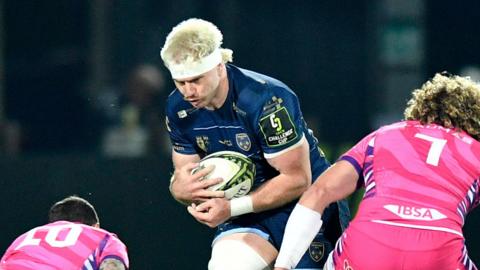 Dragons number eight Aaron Wainwright carries the ball at Zebre