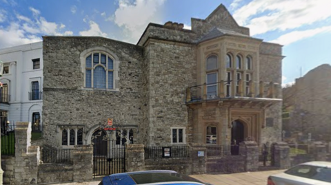 A Google Street Map image of an old stone building.