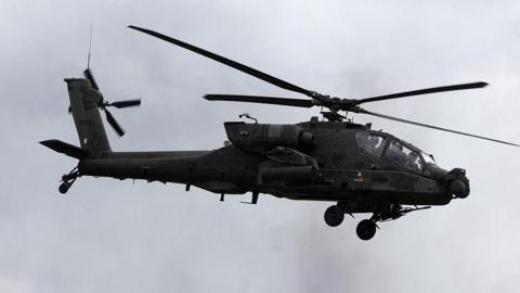 image of military helicopter flying