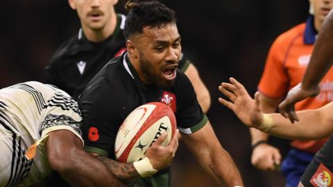 Willis Halaholo of Wales is tackled by Zurile Togiatama of Fiji in a game played in 2021