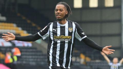 Tyrese Hall celebrates