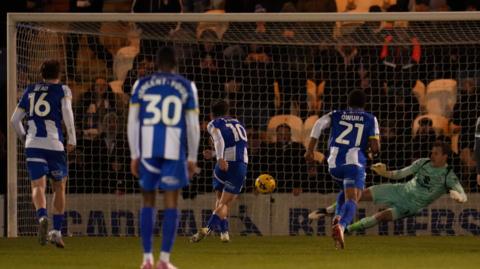 Jack Payne scores a 94th-minute penalty for Colchester in their 1-0 win over MK Dons