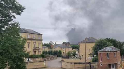 Image of smoke in the sky in the distance