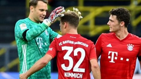 Bayern's Manuel Neuer, Joshua Kimmich and Benjamin Pavard celebrate