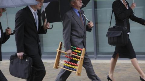 man carrying abacus