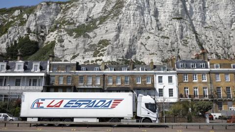 Lorry in front of white cliffs of Dover