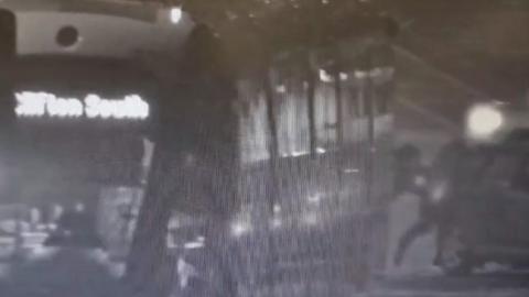 Tram passengers push car off tracks