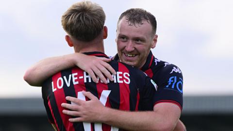 Luke Jephcott and Tyler Love-Holmes celebrate a goal