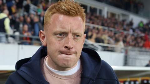 English coach Will Still looks on during a Reims game