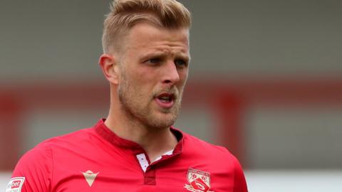 Harry Davis in action for Morecambe