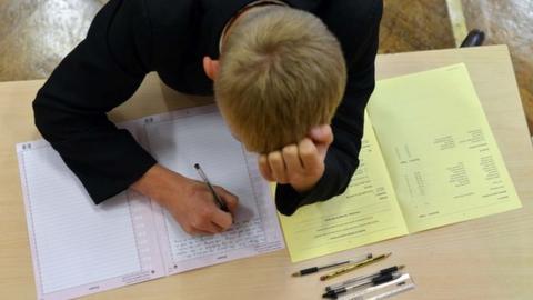 Boy doing an exam.