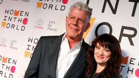Anthony Bourdain with his girlfriend Asia Argento, a film director, at the Women in the World summit in April 2018. Argento is a high-profile founder of the #MeToo movement.