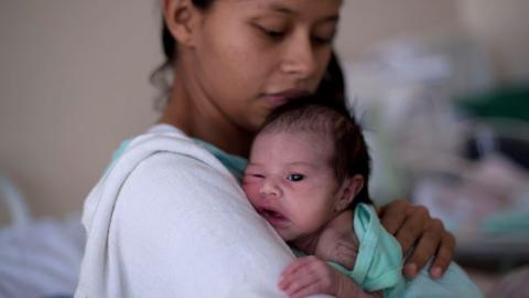 A Venezuela mother with her newborn baby