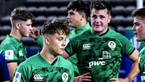 Ireland players dejected after defeat