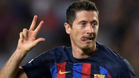 Robert Lewandowski celebrates scoring a hat-trick for Barcelona against Viktoria Plzen in the Champions League