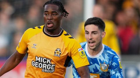 Fejiri Okenabirhie in action for Cambridge United