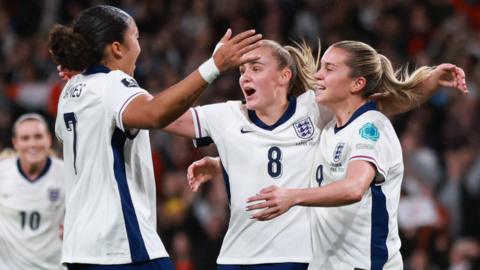 Alessia Russo and England celebrate scoring against Sweden