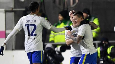 AFC Wimbledon celebrate goal against Newport