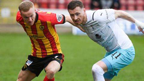 Partick Thistle's Scott Tiffoney and Inverness' Shane Sutherland during a cinch Premiership Play-Off Quarter Final 1st Leg