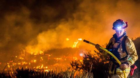 Firefighters tackle the Thomas Fire as in Ventura, California