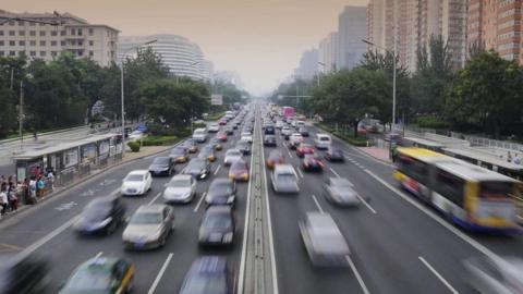 Cars on a Beijing road as the ý explores China's sharing economy