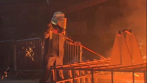 A steel worker in the blast furnace