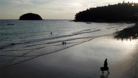 Tourists on a beach in Phuket, Thailand