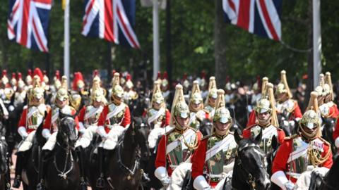 The Household Cavalry ride down The Mall during the Trooping the Colour parade on June 02, 2022 in London, England