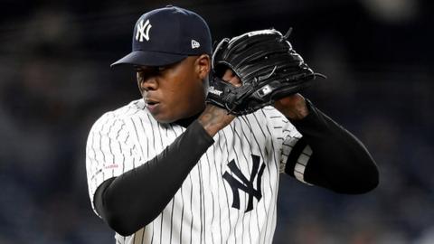 Aroldis Chapman of the New York Yankees pitches during a game at Yankee Stadium