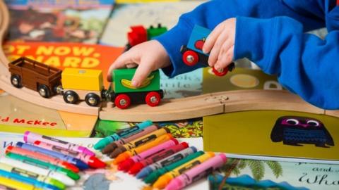 child playing with toys