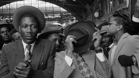 West Indian migrants arrive at Victoria Station, London, after their journey from Southampton Docks in 1956