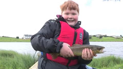 A boy fishing