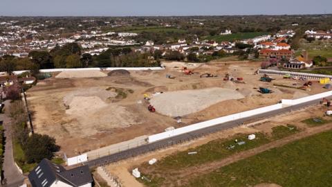 An aerial view of a building site.