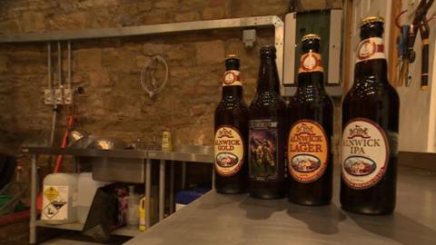 Bottles of beer produced by the Alnwick Brewery Company