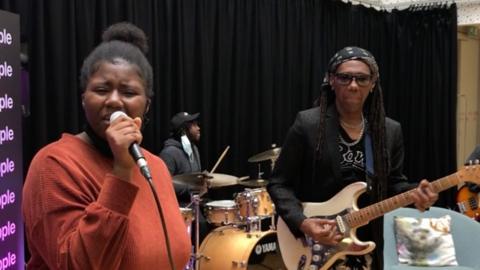 Nile Rodgers jamming with young musicians