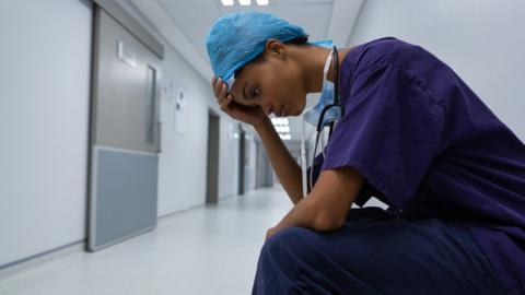 Black nurse in hospital