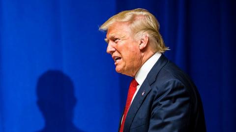 Donald Trump walks on stage at a Cleveland rally.