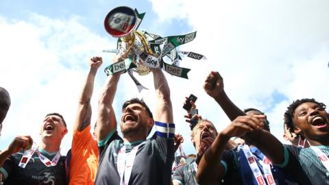 Plymouth Argyle celebrate winning the League One title