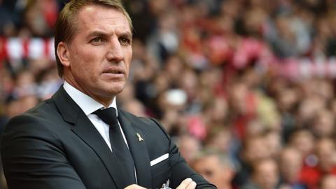 Brendan Rodgers stands in front of the Anfield crowd before Liverpool's match with Norwich in 2015