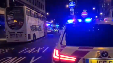 Emergency services responding to the incident on the bus