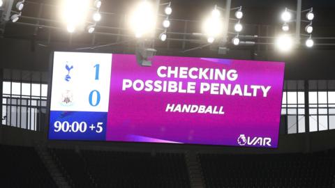 Big screen at Tottenham confirming a penalty has been awarded via VAR for handball